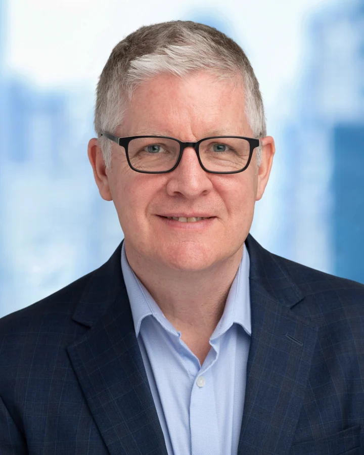 Corporate portrait of a man wearing glasses