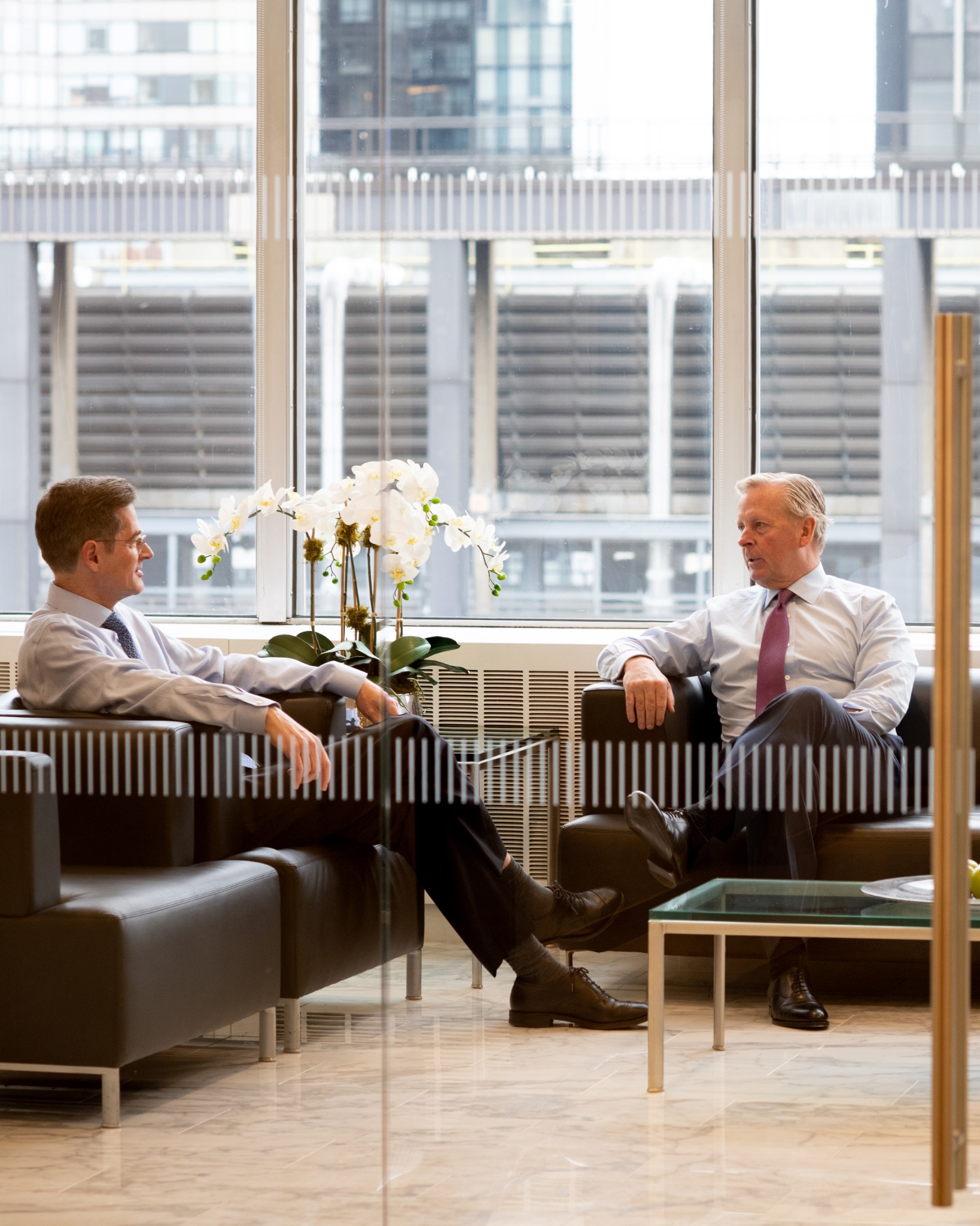 Two colleagues in conversation in a New York office